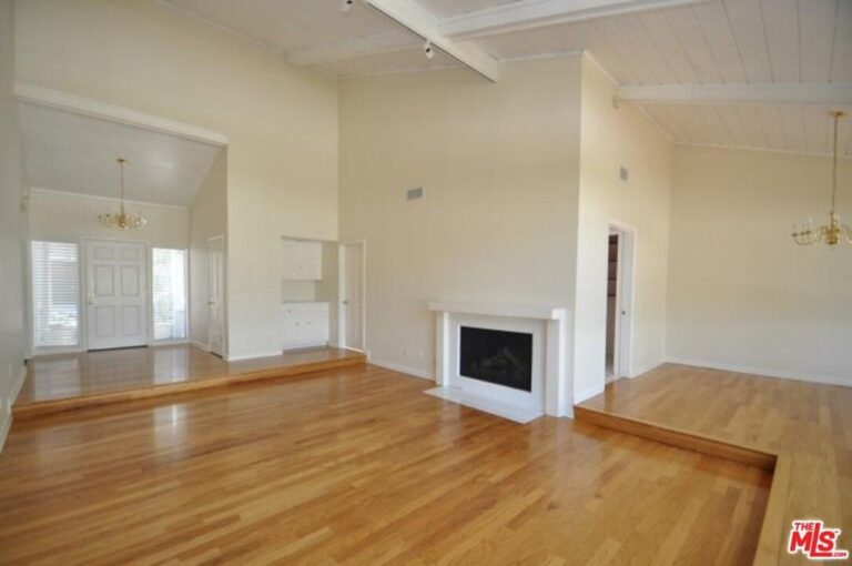 not furnished living room with hardwood floors
