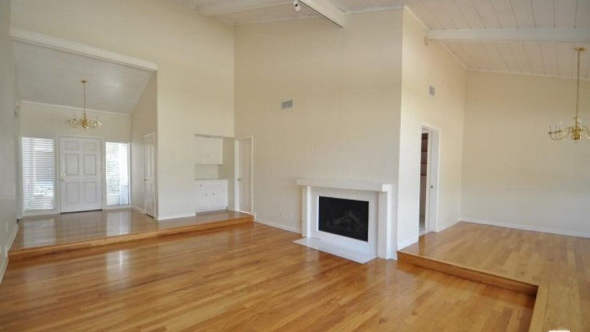 not furnished living room with hardwood floors